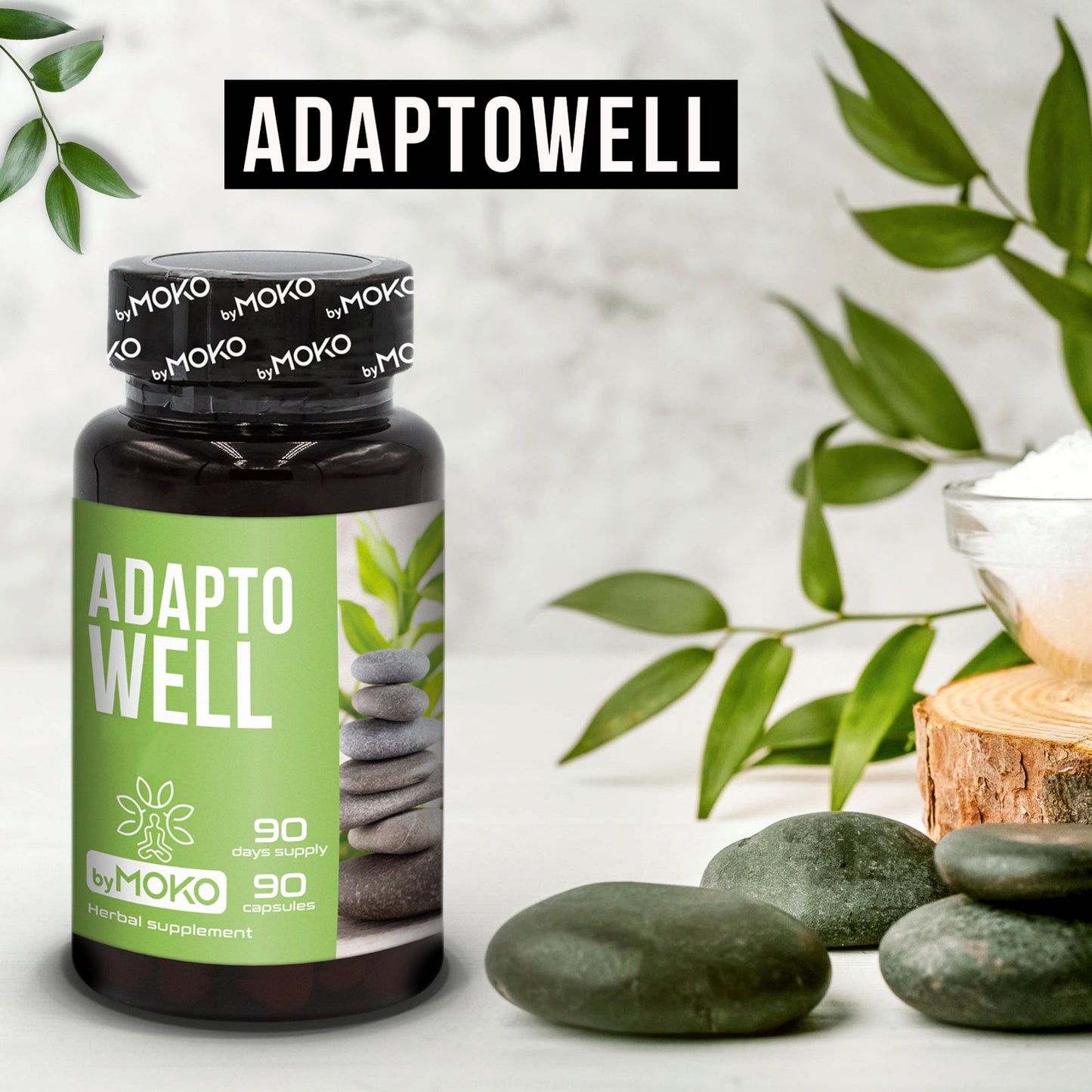 Adaptowell supplement bottle with stones and leaves on a light background