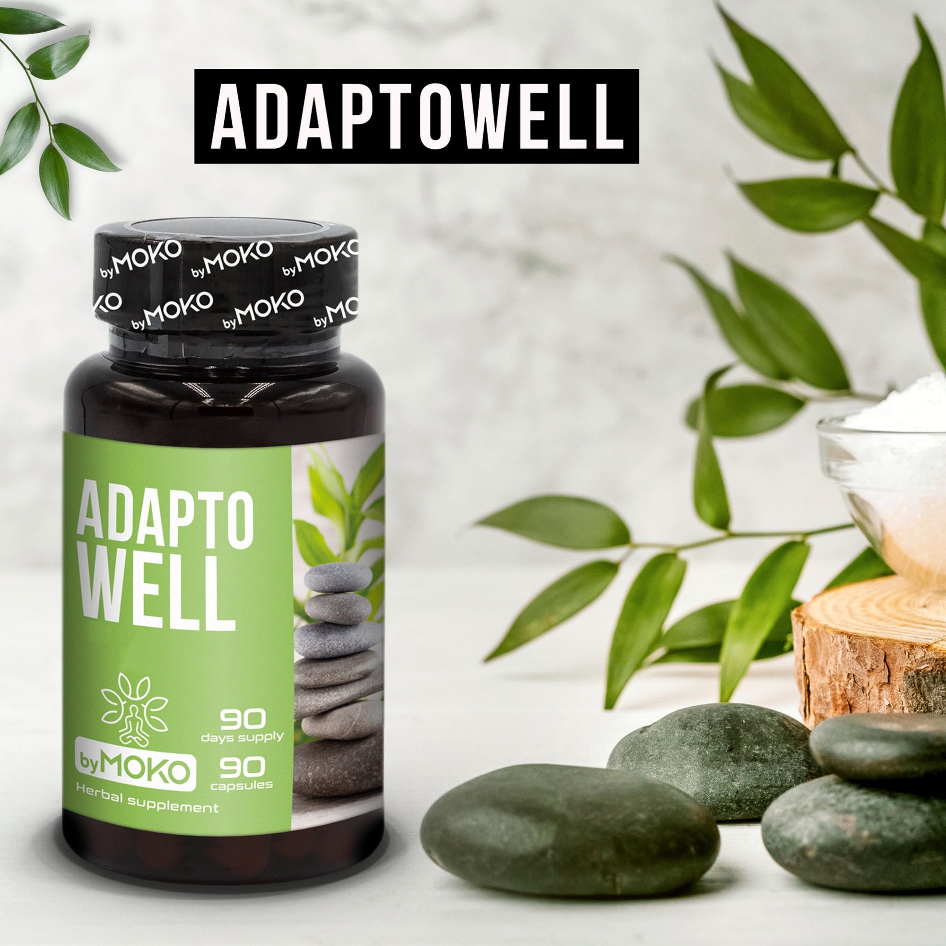 Adaptowell supplement bottle with stones and leaves on a light background
