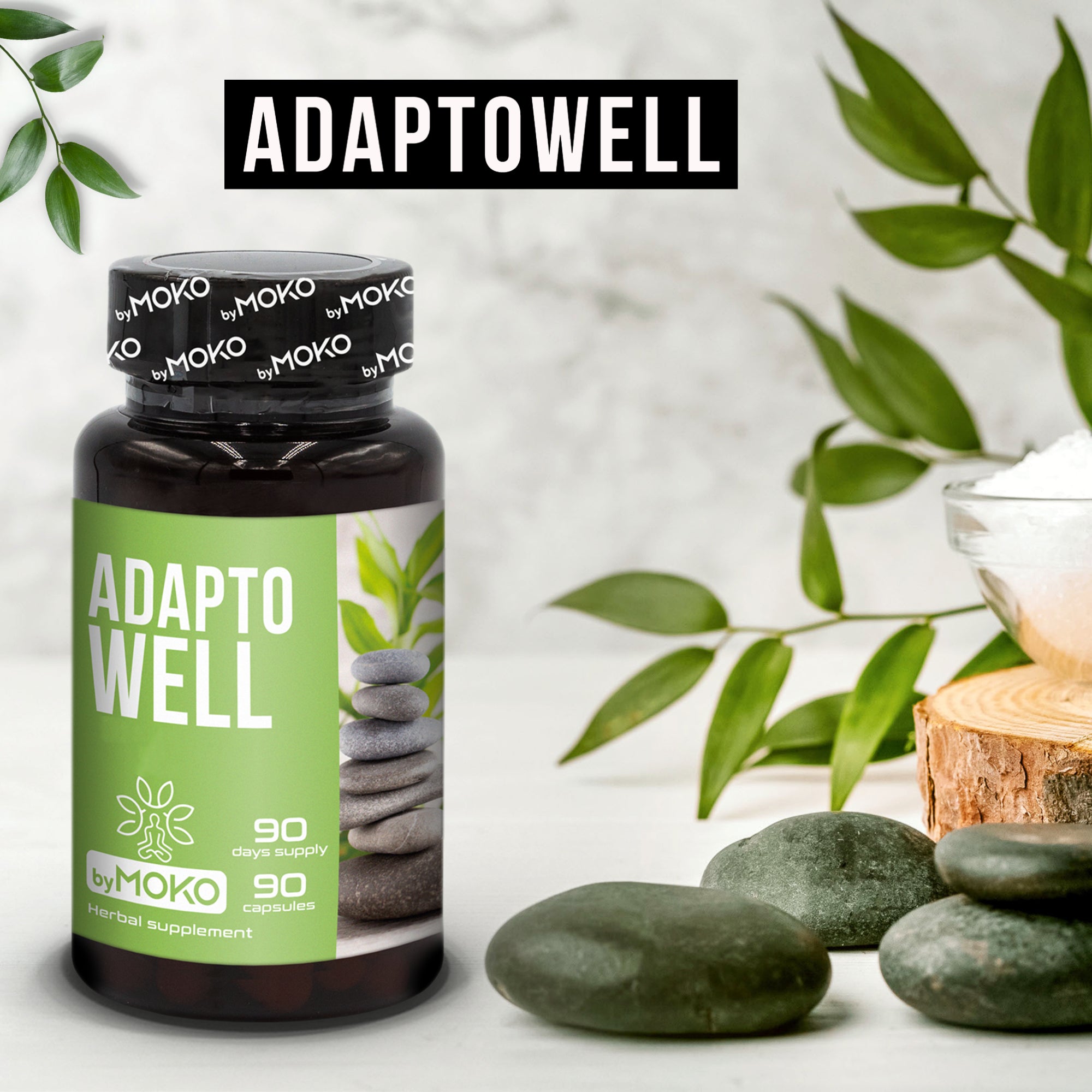 Adaptowell supplement bottle with stones and leaves on a light background
